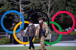 Tokyo Olympics on, organizers say, as virus hits Japan events