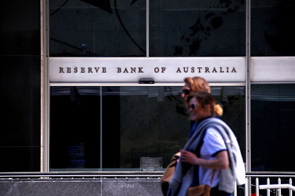 Australia central bank cuts rates to record low on virus fears 1