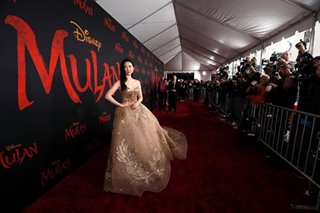 'Mulan' goes on, Bond waits as Hollywood tracks virus spread