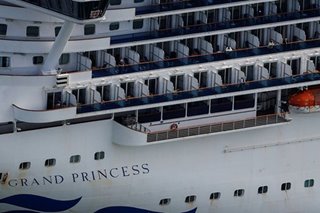 Virus-hit cruise ship passengers face wait in California port
