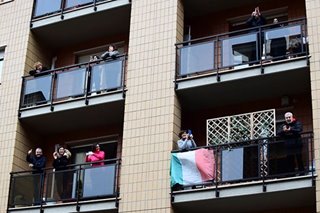 Italians defy coronavirus with mass singing, applause for doctors