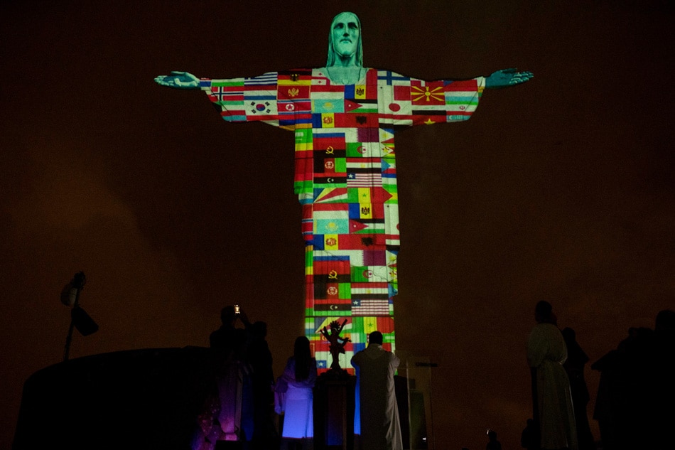 Christ the Redeemer in Brazil lights up for coronavirus-hit countries