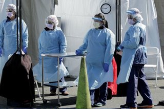 'It feels like a war zone': US doctors, nurses plead for masks on social media