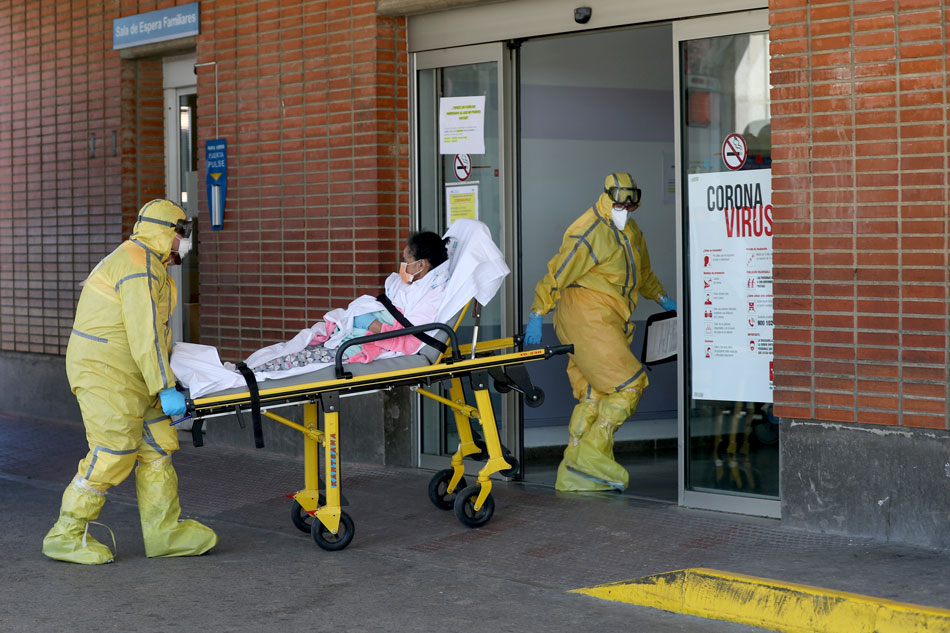 Spain&#39;s COVID-19 death toll rises by over 500; hospitals under pressure 1