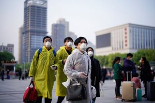 China reports no new virus cases for first time