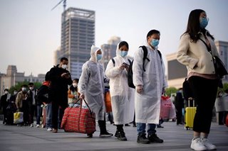 Wuhan exodus sparks virus hope despite mounting death toll