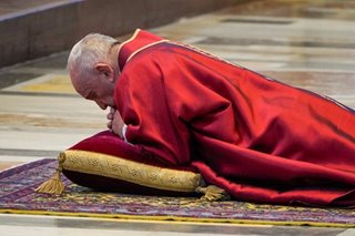 Pope Francis leads Veneration of the Cross