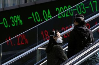Asia shares off to cautious start, US crude slides