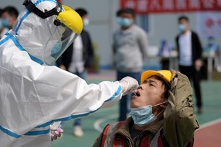Slowly but steady, China strives to make widespread virus testing the new normal