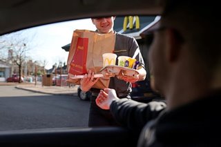 McDonald's profits fall on virus as consumer traffic shifts