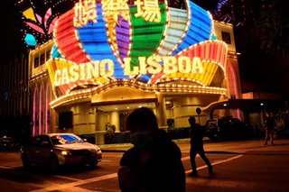 Pandemic-hit Macau casinos look to play the long game with cash pile