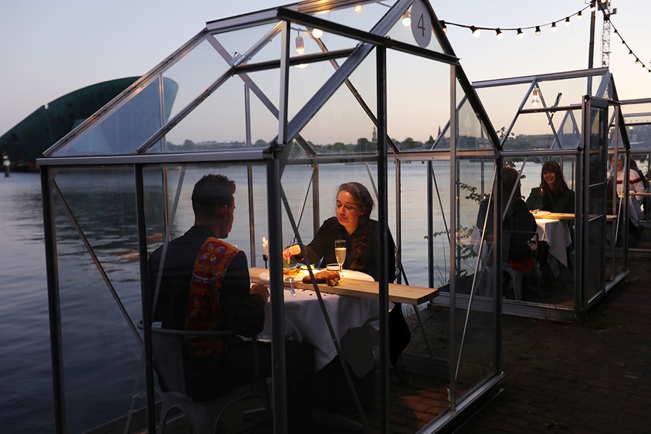 Dutch restaurant trials glass booths for dining amid coronavirus 1