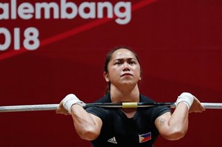 Weight off their minds: Olympian Hidilyn Diaz's online workouts feed Filipino families