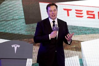 Musk says 'restarting' California Tesla factory, defying authorities