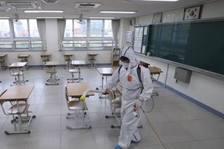 Schools reopen in South Korea as virus fears ease