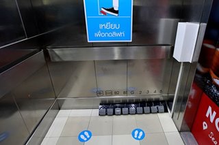 Look, no hands! Thai mall puts pedals in lifts to keep coronavirus at bay