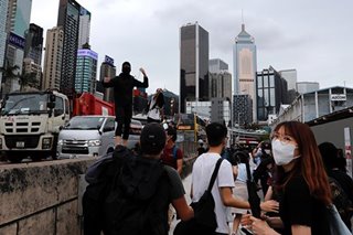 Top HK court rules vs gov't bid to expand riot prosecutions