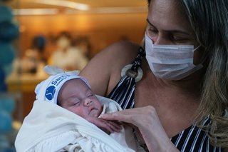 Brazilian nurse with COVID-19 reunited with her baby after giving birth on ventilator