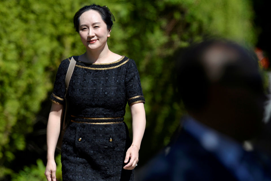 Huawei Technologies Chief Financial Officer Meng Wanzhou leaves her home to attend a court hearing in Vancouver, British Columbia, Canada, May 27, 2020. Jennifer Gauthier, Reuters/File