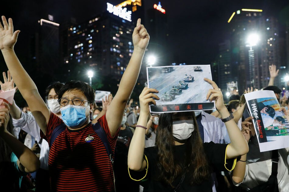 Hong Kong seethes one year on, but protesters on the back foot 1