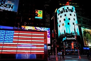 Nasdaq ends at record, confirms bull market on economic recovery hopes