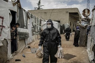 US limits virus aid for masks, gloves and other medical gear abroad