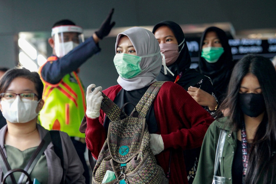 Indonesia posts record coronavirus infections as restrictions eased