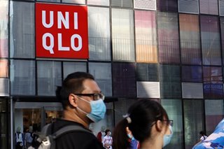 Japan shoppers queue, crash website for Uniqlo's washable masks