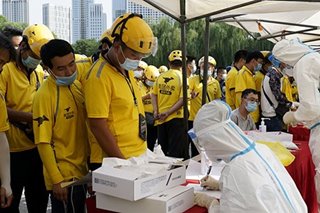 Beijing reports 22 new virus cases as millions tested