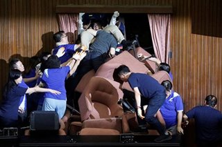Fighting in Taiwan parliament after opposition occupies chamber