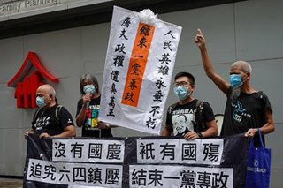 Hong Kong leader hails 'return to peace', anniversary protests banned