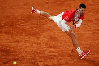 Tennis: Djokovic keeps French Open title bid on track as Kenin survives