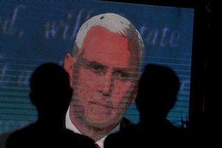 Buzz off! Errant housefly on Pence's head photobombs VP debate