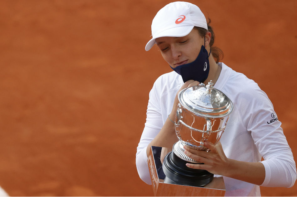 Tennis: Swiatek wants sustained success after French Open win 1