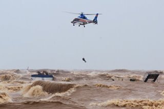 Fishermen rescued as heavy flooding hits Central Vietnam
