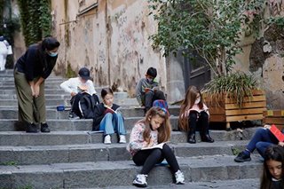 Naples teachers bring socially distanced school to streets and balconies