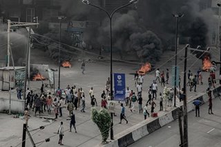 Fires burn in Lagos after Nigerian soldiers shoot anti-police protesters, dozens killed