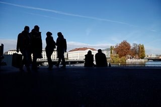 Geneva locks down as COVID-19 surges