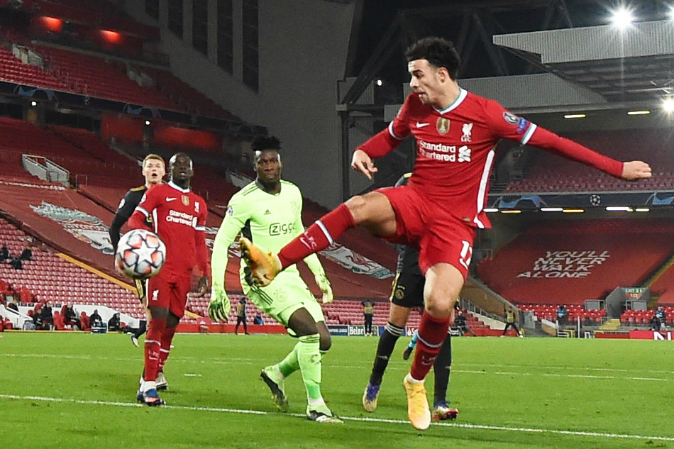 Football: Liverpool advance in Champions League 1
