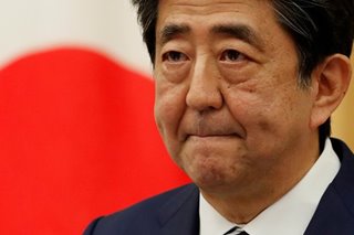 Japan prosecutors seek to question ex-PM Abe on spending scandal: media