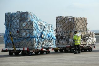 Air freight prices 'outrageous' as COVID-19 shots rolled out, says WHO expert