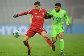 Football: Bayern keep pace with Leverkusen as Lewandowski reaches milestone
