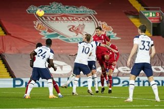 Football: Firmino sinks Spurs as Liverpool go top, 10-man Arsenal held