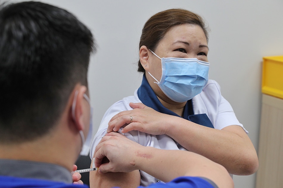Singapore begins rollout of Pfizer&#39;s COVID-19 vaccine with healthcare workers 1