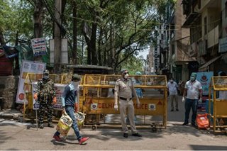 India rounds up critics under cover of virus crisis, activists say