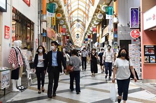 Japan confirms 1,307 coronavirus cases, another record
