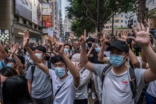 Defying China, Hong Kongers rush to buy pro-democracy newspaper