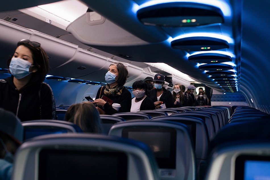 Low risk of COVID-19 infection on planes if masks worn: US military ...