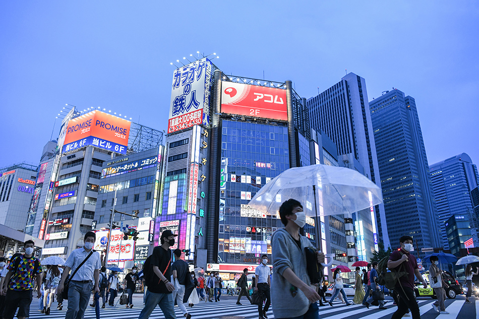 Japan set to expand state of emergency, public cools to Olympics 1