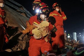 Death toll rises at collapsed hotel used for virus quarantine in China